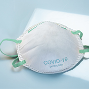 N-95 mask to protect against COVID-19, representing how W. P. Carey was protected in times of economic uncertainty and maintained rent collections among the best in the net lease and REIT sectors