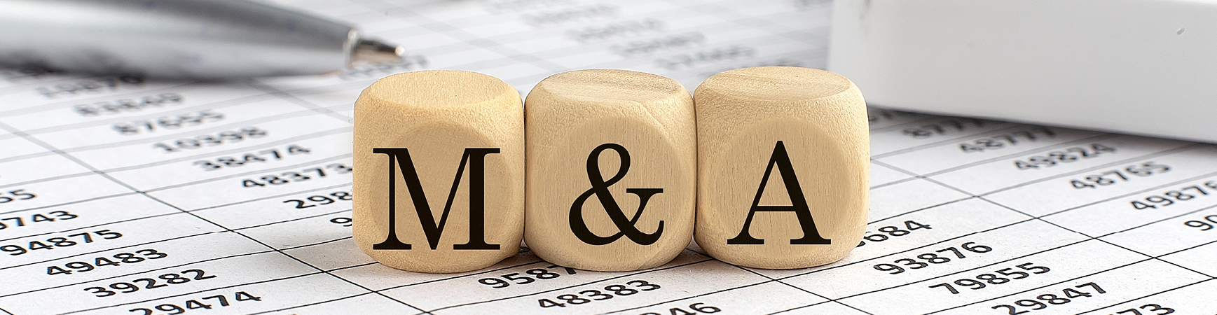Photo of blocks with M&A
