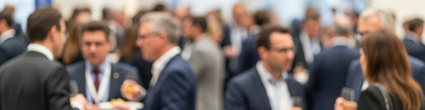 Photo of people networking at a conference