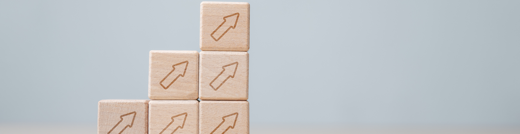 Photo of blocks with arrows pointing upward