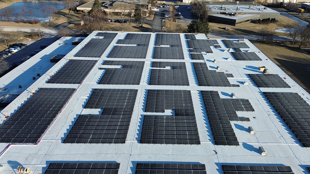 Rooftop of a warehouse filled with solar panels
