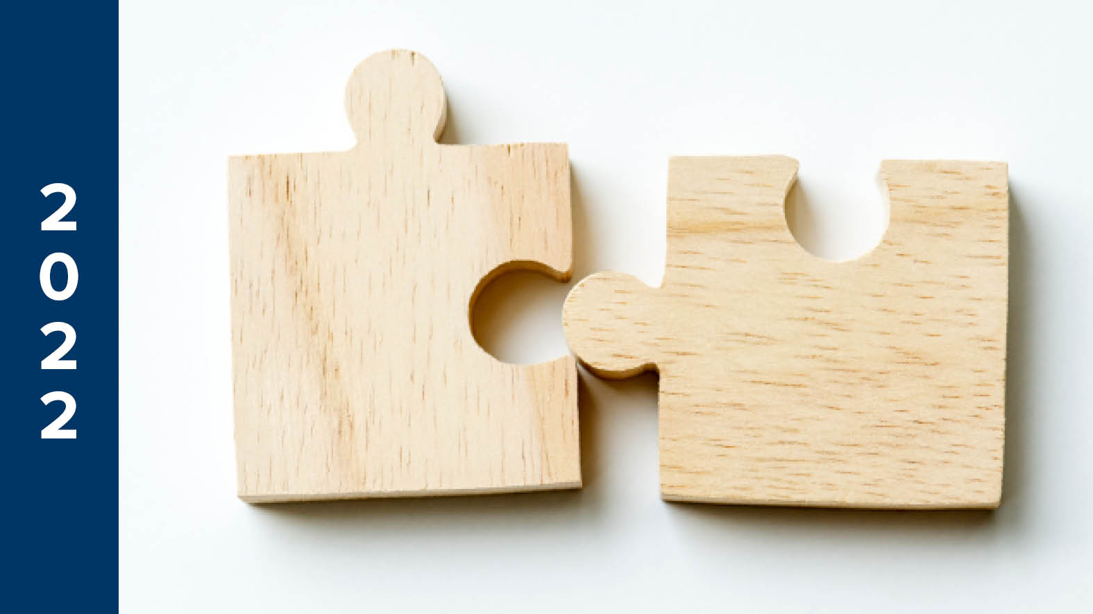 Photo of two puzzle pieces that fit together