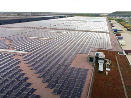 An aerial shot of solar panels on the roof of a building leased to Nippon Express and owned by W. P. Carey