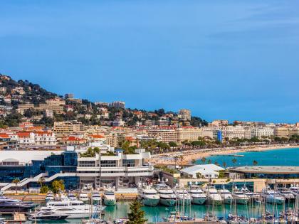 Photo of Cannes, France showcasing harbor with boats