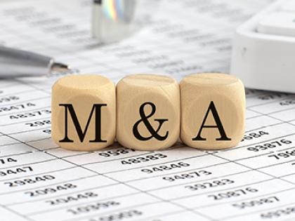 Photo of blocks with M&A on them