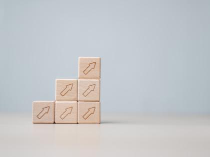 Photo of blocks with arrows pointing upward