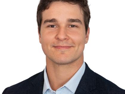 Headshot of Travis McFarling