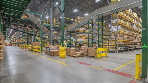 Photograph of warehouse with racks and boxes