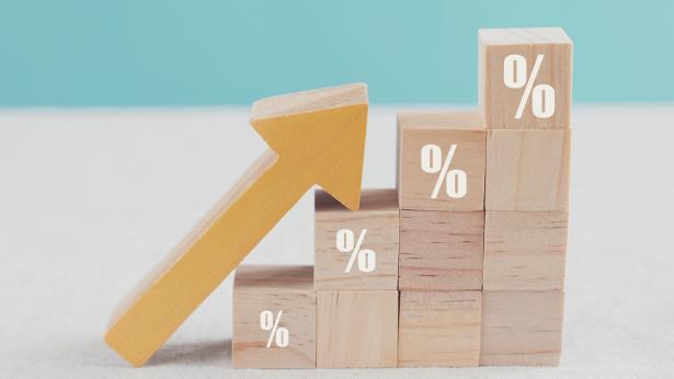 Image of building blocks depicting rising interest rates