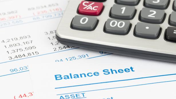 Image of balance sheet and calculator 