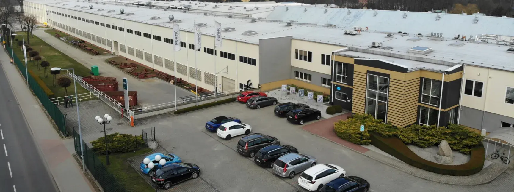Exterior of a large industrial facility owned by W. P. Carey and leased to Purmo Group