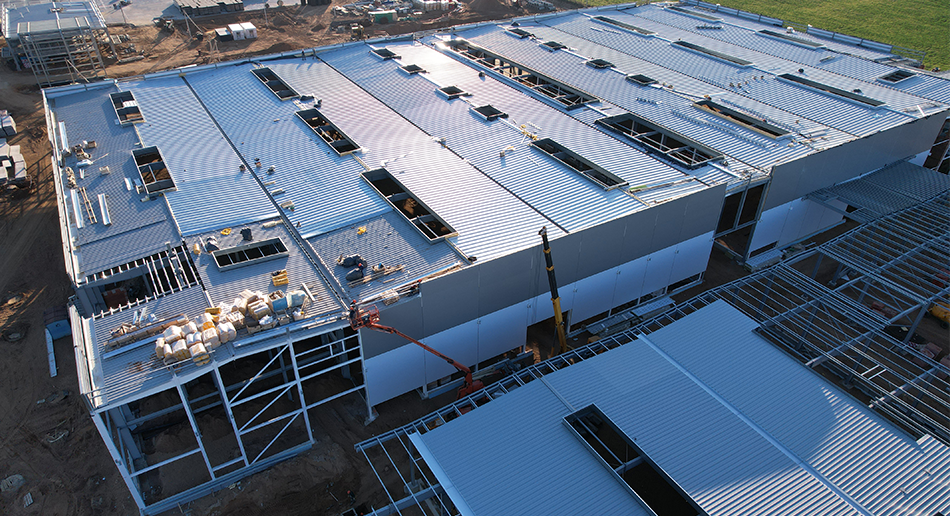 Roof of a W. P. Carey industrial warehouse to represent other energy conservation measures that can be utilized at your net leased commercial property